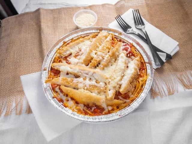 Spaghetti with chicken parmigiana.